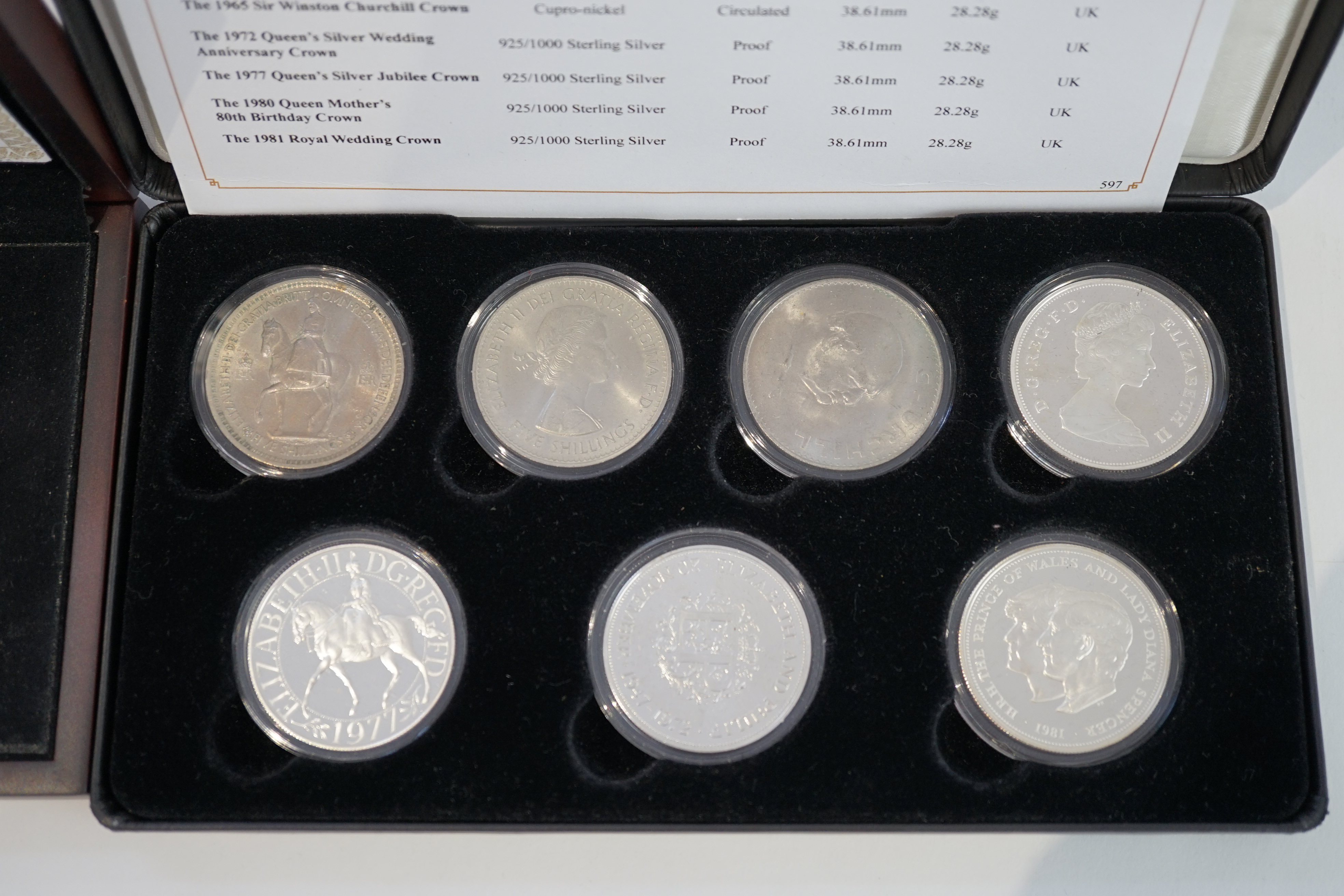 British coins, Elizabeth II, Crown collection comprising four proof silver crowns and three cupronickel crowns, 1953-1981, in Jubilee Mint fitted case with certificate, and a silver proof 50p Battle of Britain 2015, with